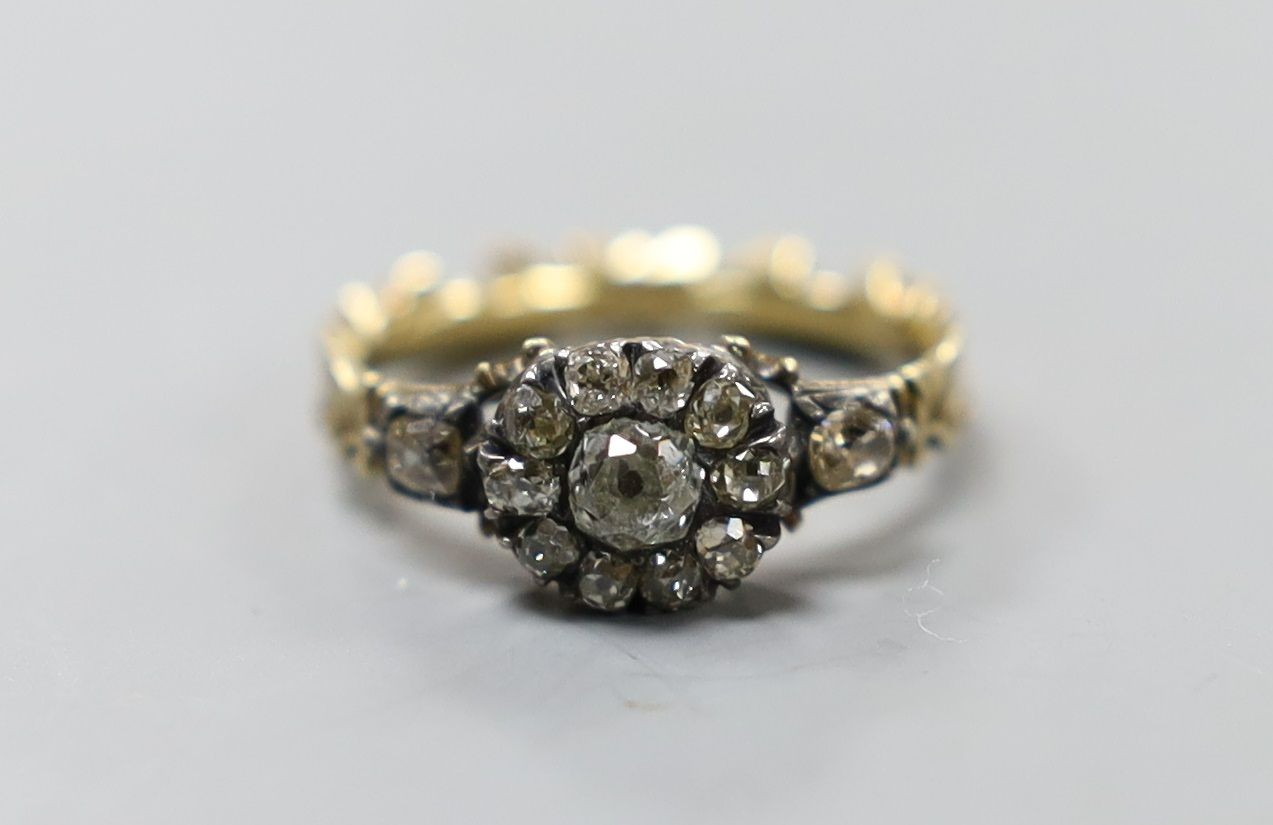 A late 18th century gold and old cut diamond set circular cluster ring